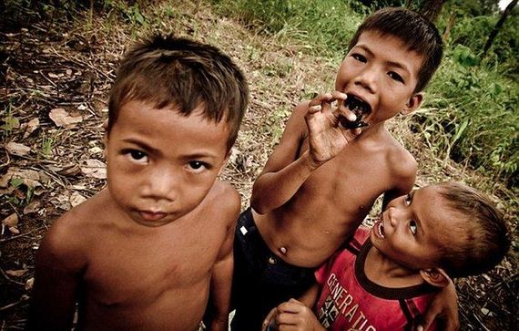 children-in-cambodia-eat-spiders