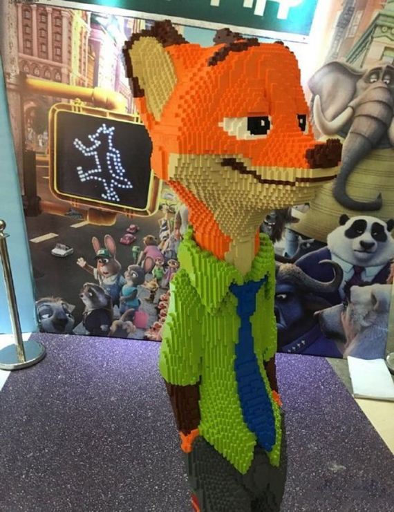 boy-destroys-lego-fox-exhibit-statue