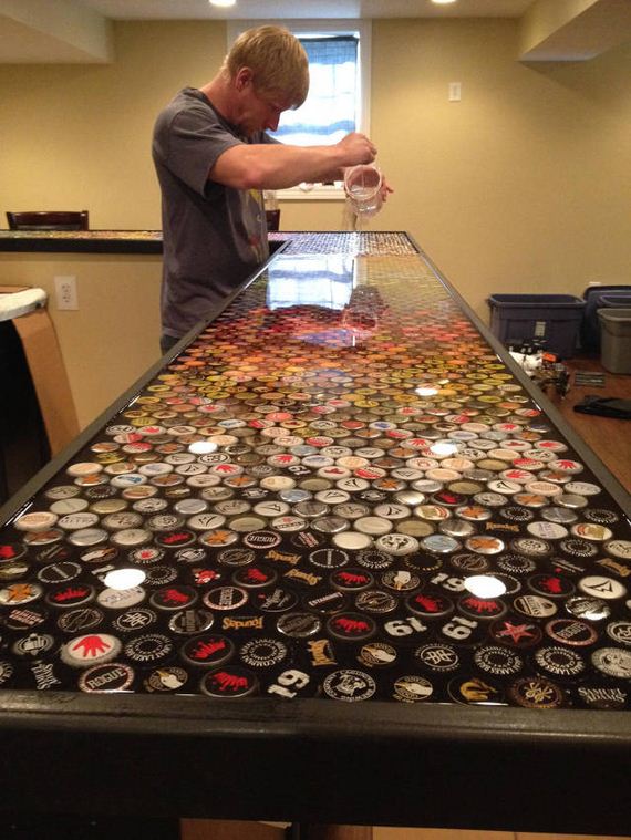 15-guy_makes_an_awesome_bottle_cap_bar_top