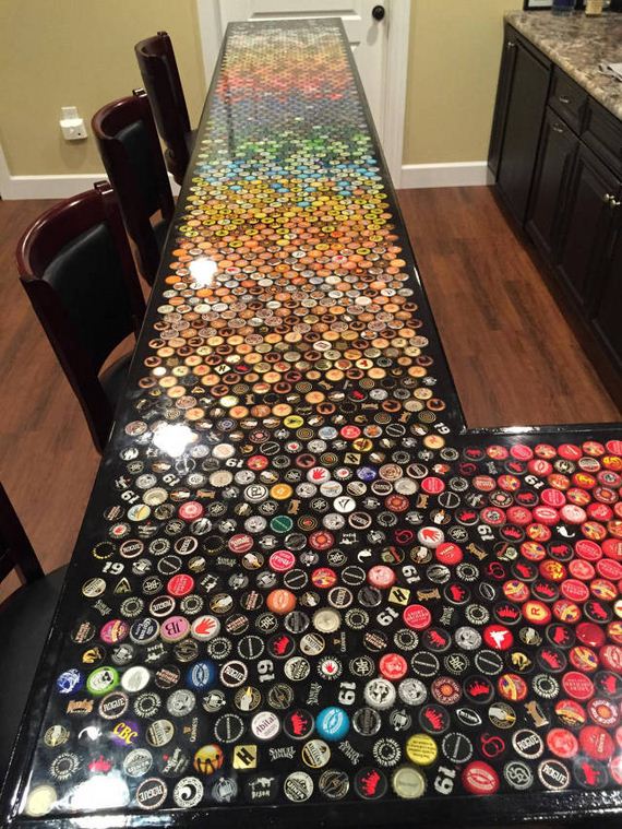 17-guy_makes_an_awesome_bottle_cap_bar_top