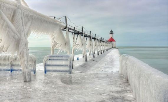 frozen_lighthouse_st_joseph_north_pier_lake_michigan