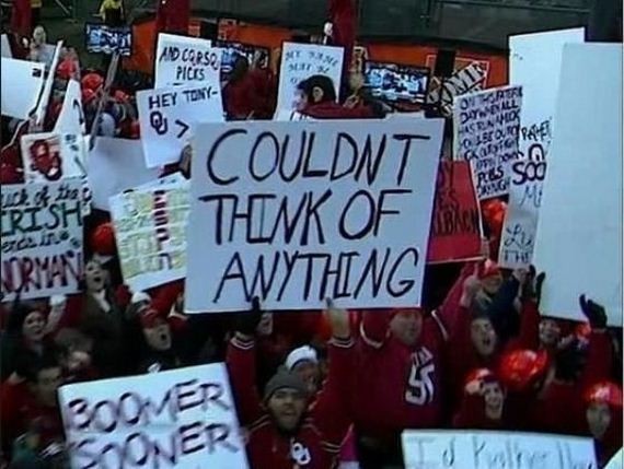 Holding-Funniest-Sports-Signs