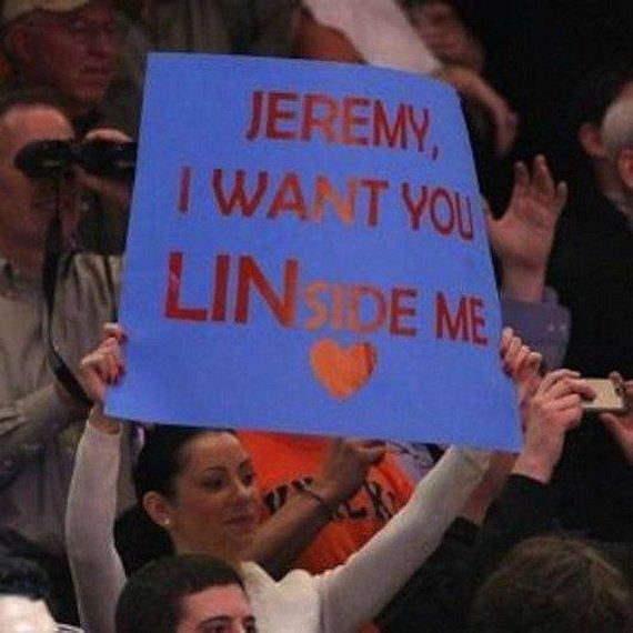 Holding-Funniest-Sports-Signs