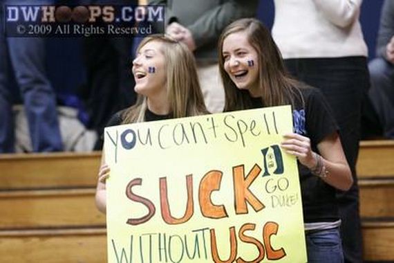 Holding-Funniest-Sports-Signs
