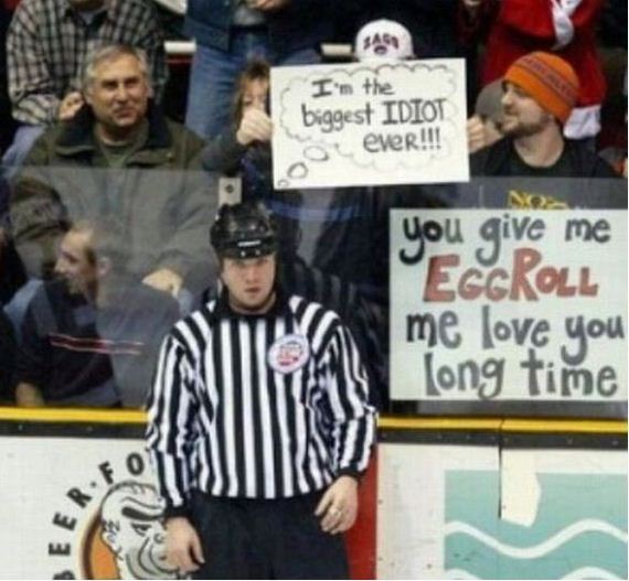 Holding-Funniest-Sports-Signs