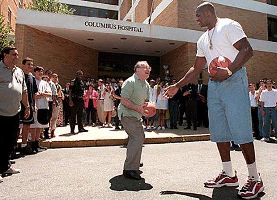 Shaq-Holding-Things