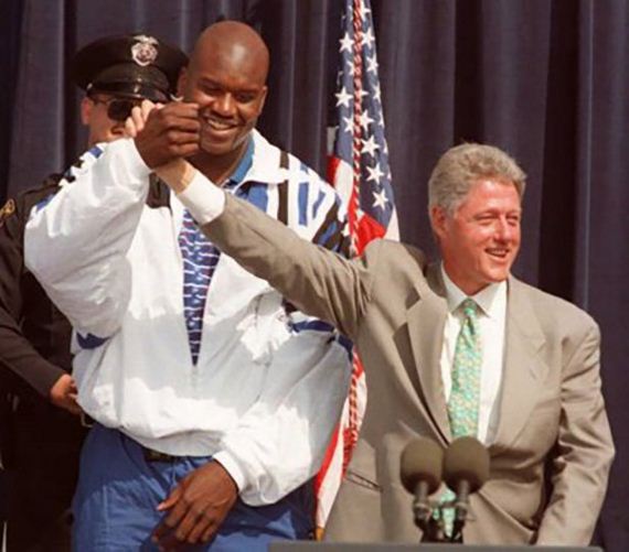 Shaq-Holding-Things