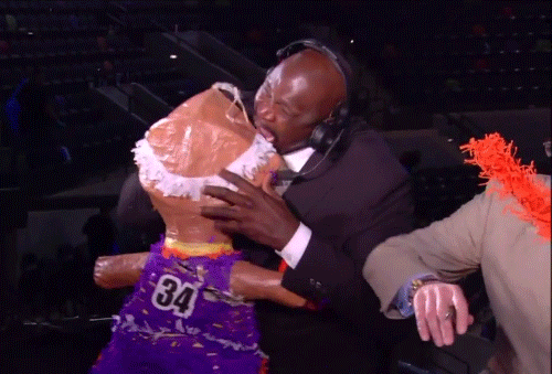 Shaq-Holding-Things