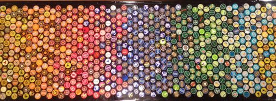 07-guy_makes_an_awesome_bottle_cap_bar_top