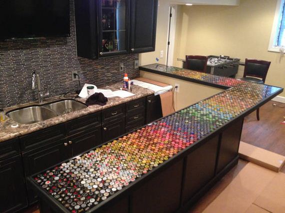 09-guy_makes_an_awesome_bottle_cap_bar_top