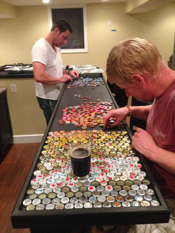 11-guy_makes_an_awesome_bottle_cap_bar_top