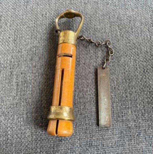 Vintage wooden and metal tool