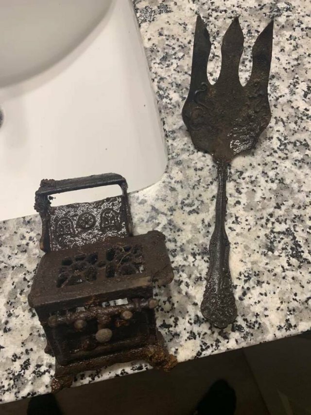 Tiny cast iron doll house stove