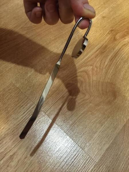 A slim decorative object