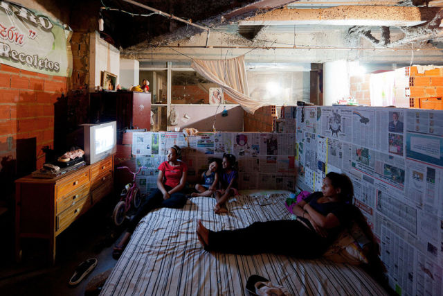 A family home with newspaper used as wallpaper