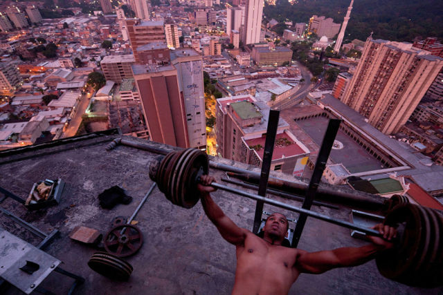 A gym inside the tower with improvised weights