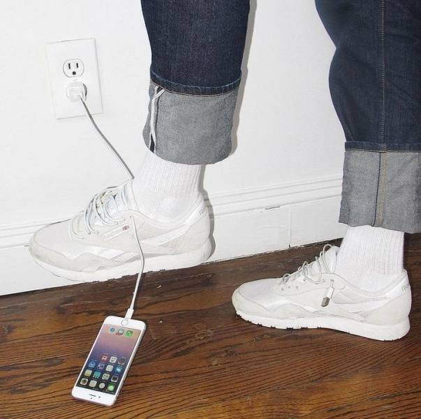 A phone charging in an odd spot
