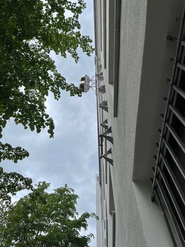 Two chrome balls on a building