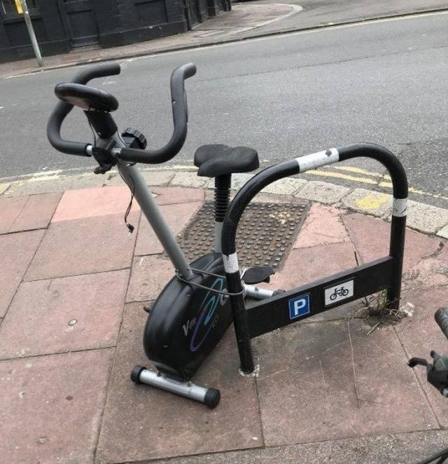 An exercise bike locked up outside