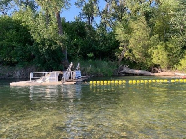 Rotating drums in a river